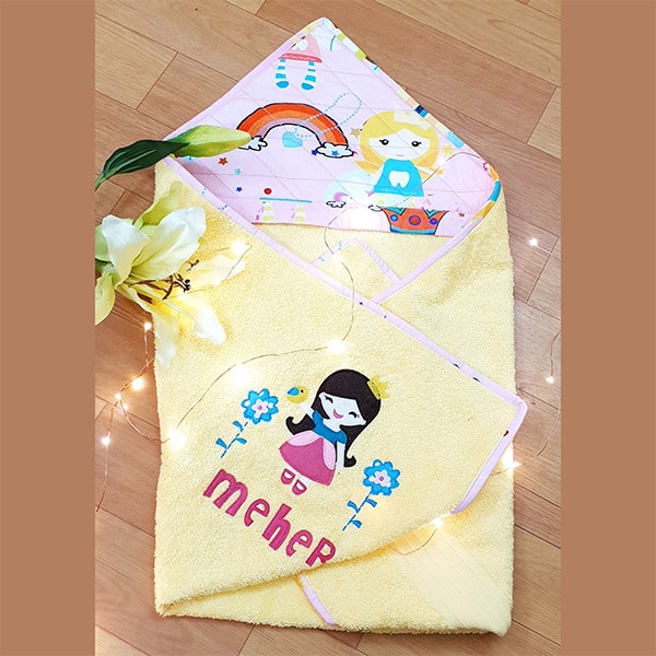 Princess Yellow Hood Towel - Close-up of Princess Logo on Yellow Hood Towel 