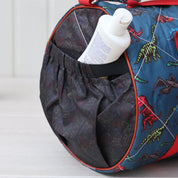 Glow Dino Duffle Bag