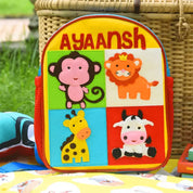 Four Animals Backpack  - Close-up of Four Animals Logo on Backpack 2          