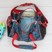 Glow Dino Duffle Bag